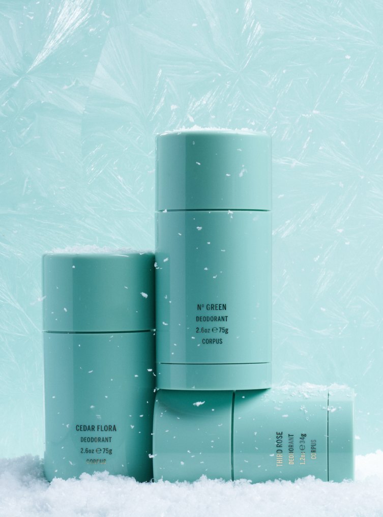 Deodorant sticks in front of frosted glass